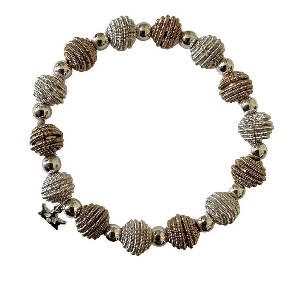 Silver and gold tone spring beads bracelet